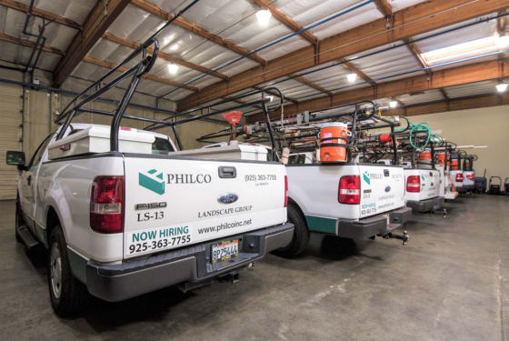 Multiple Philco service trucks parked in the main Philco parking garage